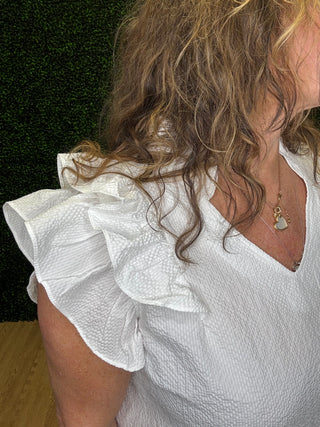 Umgee Textured Ruffle Sleeve V-Neck Blouse