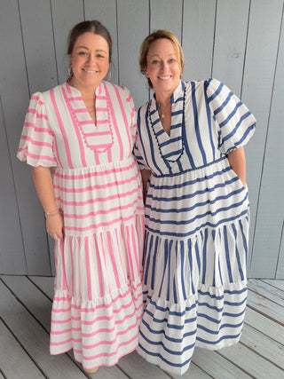 Owners of JJ Rae Boutique with striped dresses on in pink/white and blue/white
