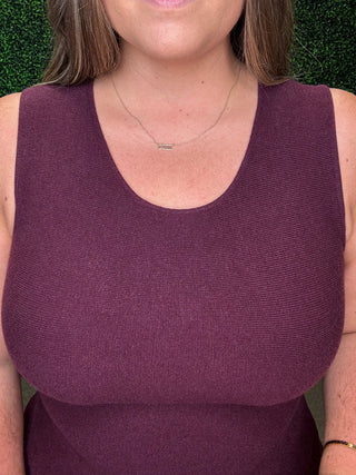 Sleeveless Peplum Sweater Top