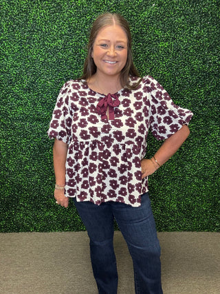 Woven peplum floral blouse