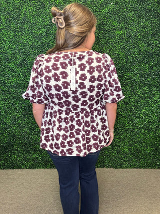 Woven peplum floral blouse