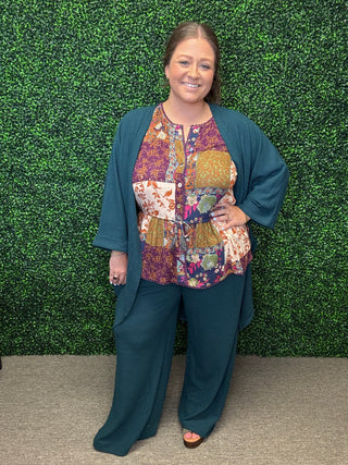 FLORAL PRINTED RAYON GAUZE PEPLUM TOP
